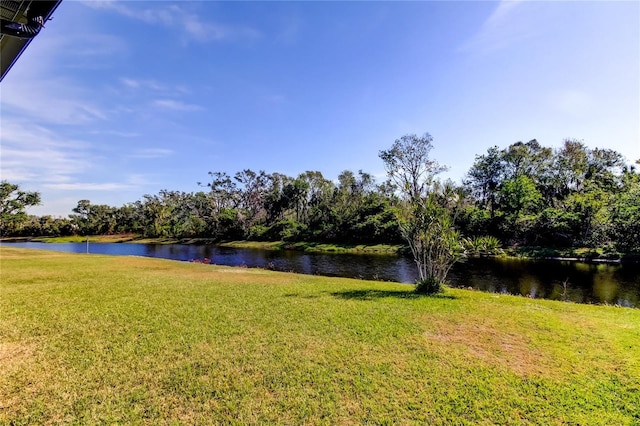 view of yard with a water view