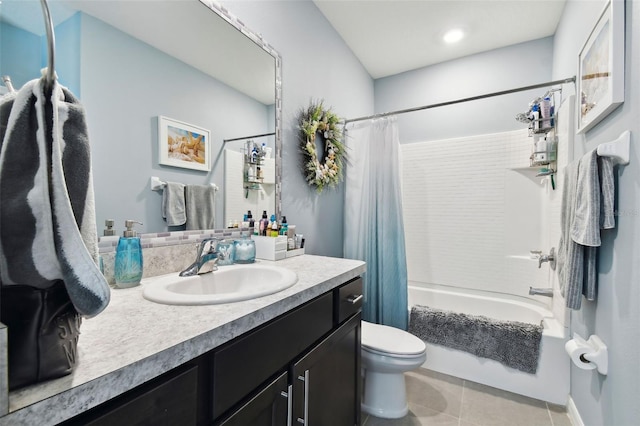 full bathroom with tile patterned floors, shower / tub combo with curtain, vanity, and toilet