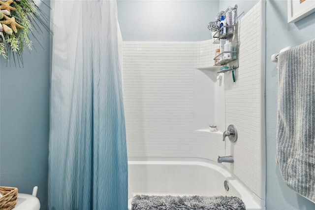 bathroom with shower / tub combo