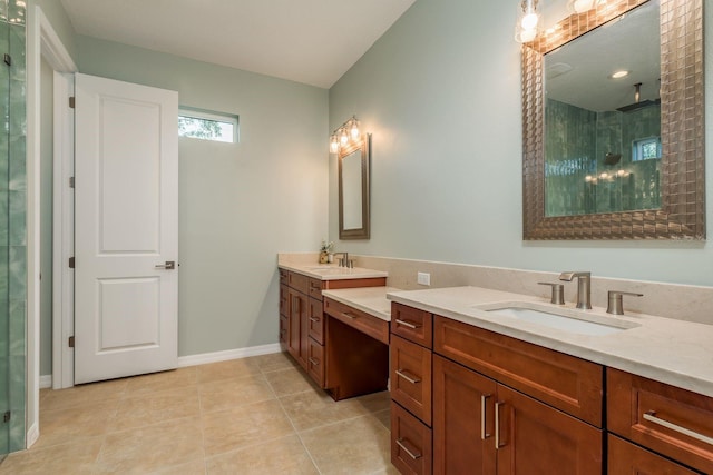 bathroom featuring vanity, tile patterned floors, and walk in shower