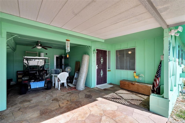 doorway to property featuring ceiling fan and a patio area