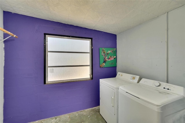 laundry room featuring washing machine and dryer