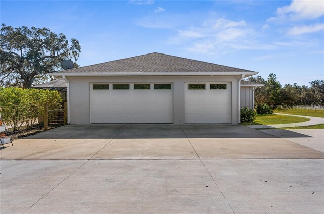 detached garage with fence