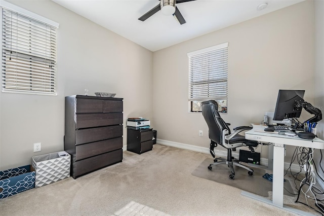 office featuring ceiling fan and light colored carpet