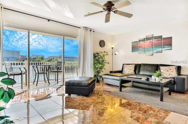 19811 Gulf Blvd Unit 102, Indian Shores, FL 33785 - living room featuring tile patterned floors and ceiling fan