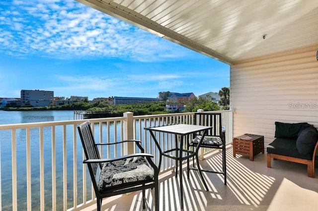 19811 Gulf Blvd Unit 102, Indian Shores, FL 33785 - balcony featuring a water view