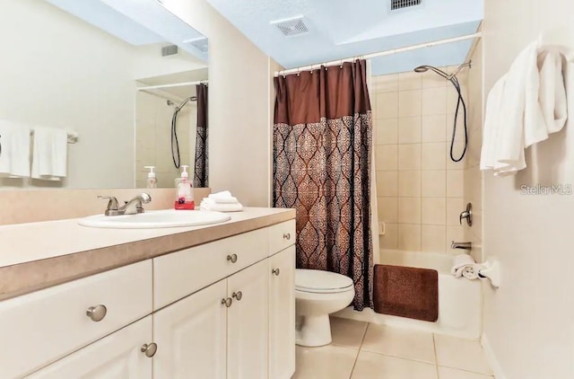 19811 Gulf Blvd Unit 102, Indian Shores, FL 33785 - full bathroom featuring toilet, tile patterned floors, vanity, and shower / bath combination with curtain