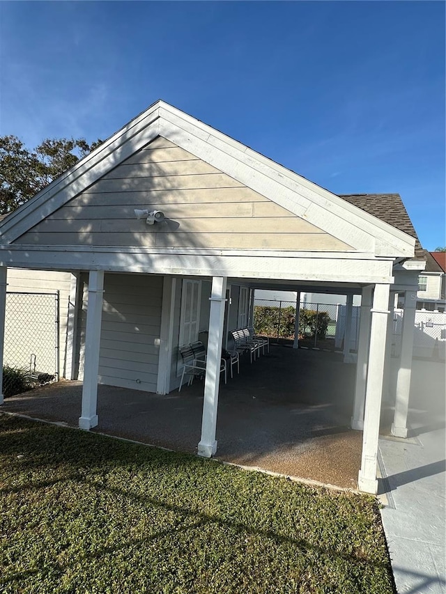 view of parking / parking lot with a carport