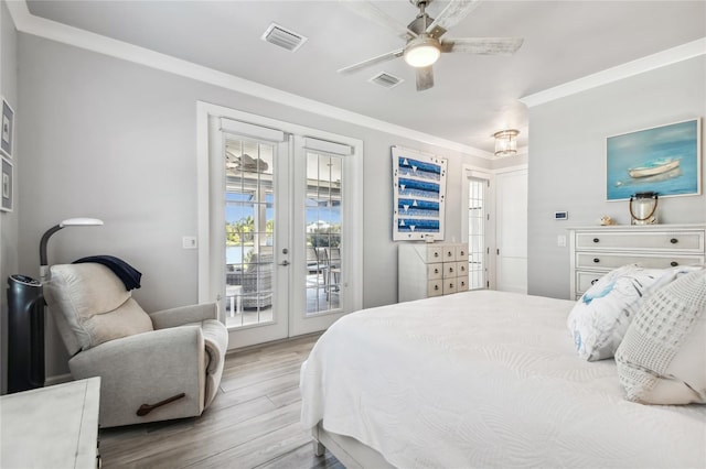 bedroom featuring access to exterior, french doors, ornamental molding, ceiling fan, and light hardwood / wood-style floors