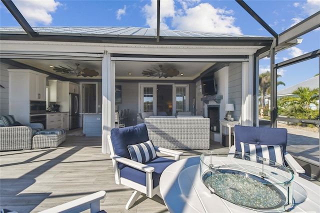 view of patio with a lanai