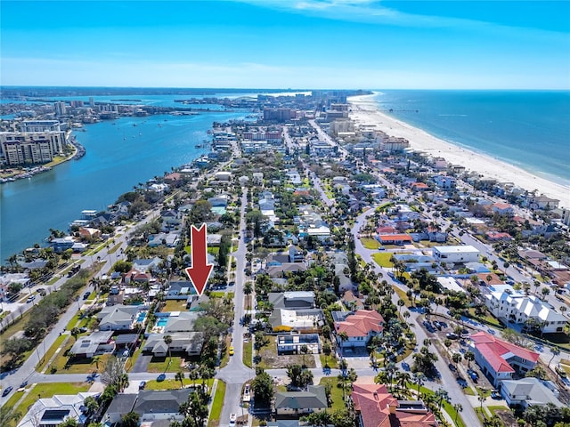 aerial view featuring a water view and a beach view