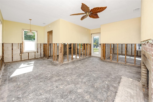 unfurnished room with ceiling fan