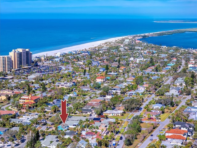 aerial view featuring a view of the beach and a water view