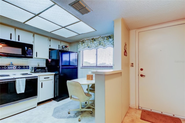 kitchen featuring backsplash, white cabinets, black appliances, and a textured ceiling