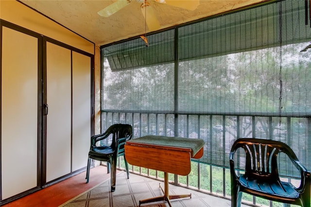 balcony featuring ceiling fan