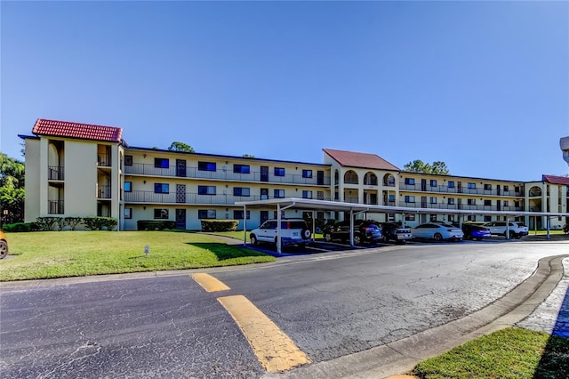 view of property with covered parking