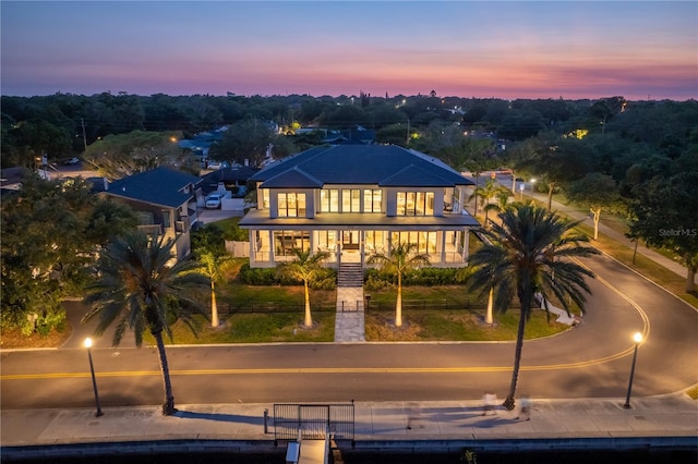 view of front of property with a balcony