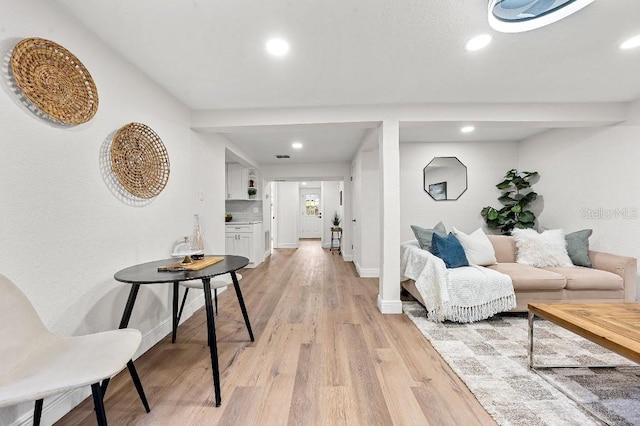 living room with light hardwood / wood-style floors