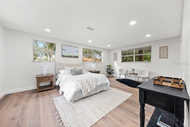 bedroom with light wood-type flooring