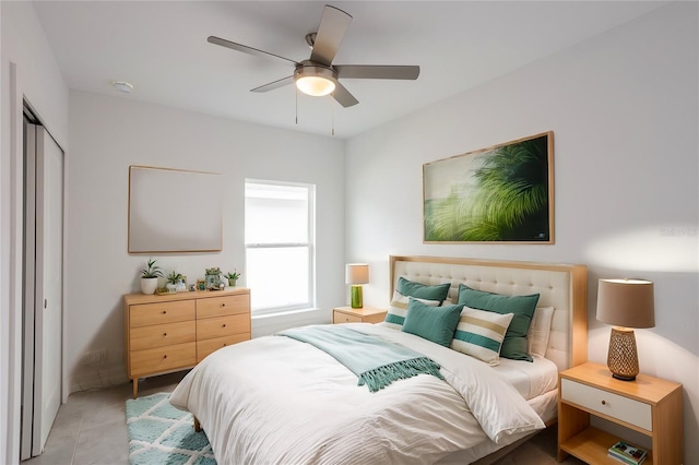 479 Winwood Ct, Port Charlotte, FL 33954 - tiled bedroom with ceiling fan and a closet