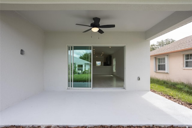 view of patio featuring ceiling fan