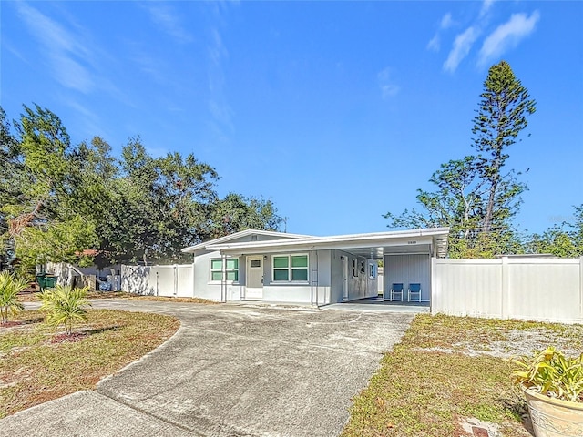 manufactured / mobile home featuring a carport