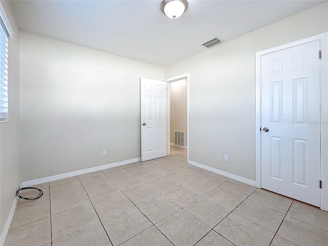 view of tiled spare room