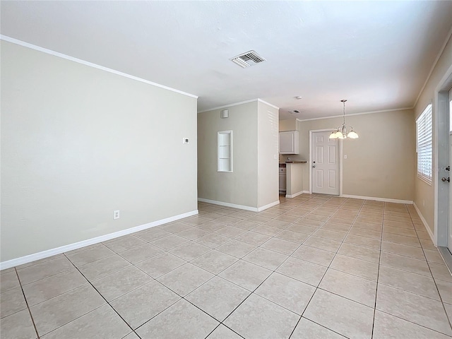 unfurnished living room featuring ornamental molding, a notable chandelier, and light tile patterned flooring