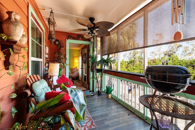 balcony with ceiling fan and grilling area