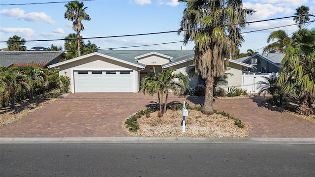 single story home featuring a garage