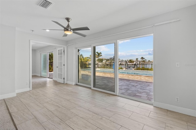 spare room with ceiling fan