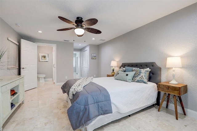 bedroom featuring connected bathroom and ceiling fan