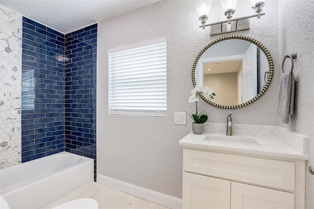 bathroom featuring tile patterned flooring, tiled shower / bath combo, a textured ceiling, and vanity