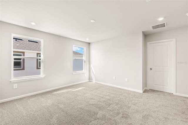 view of carpeted spare room