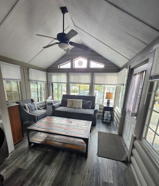 sunroom featuring ceiling fan, a healthy amount of sunlight, and lofted ceiling