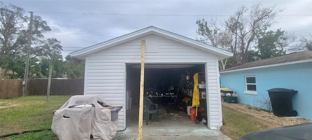 view of outbuilding with a lawn