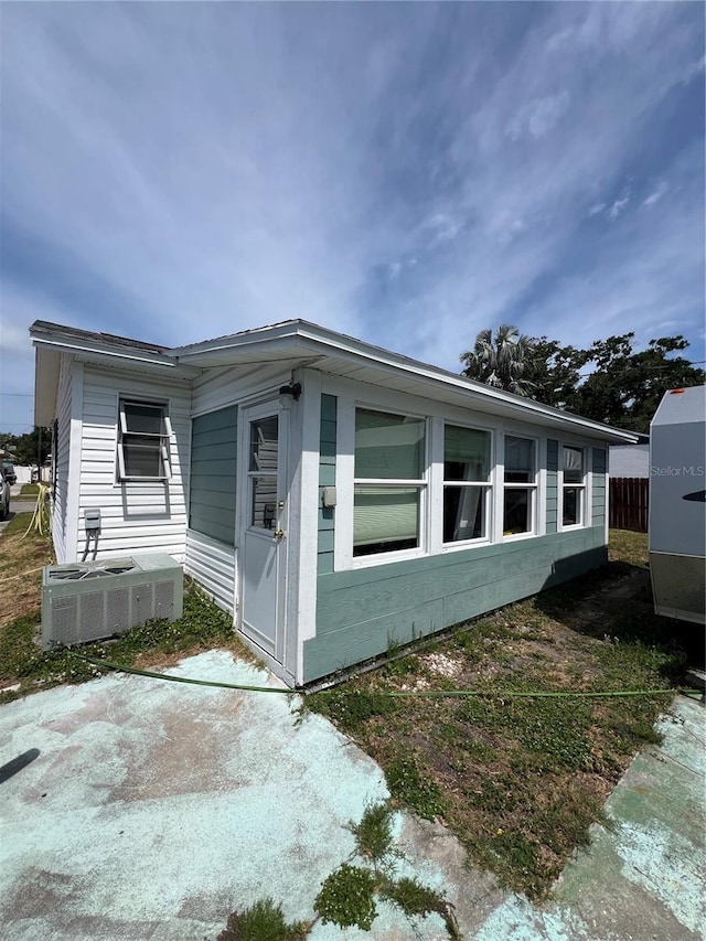 2800 47th St S, Gulfport, FL 33711 - view of side of property featuring central AC