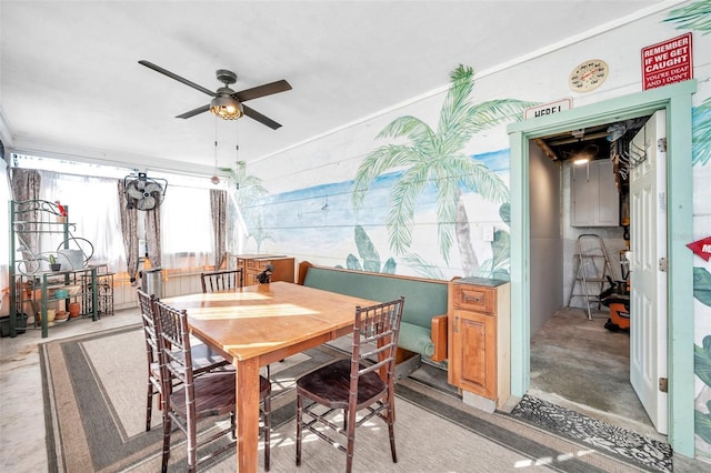 dining area with ceiling fan