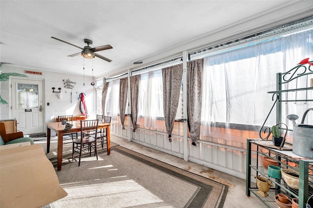 dining space with ceiling fan