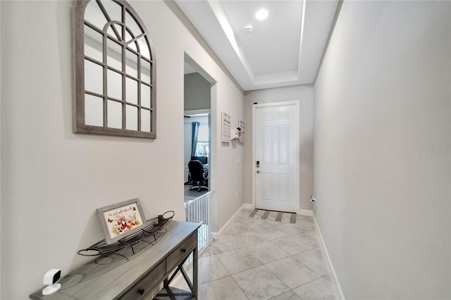 doorway to outside featuring light tile patterned floors