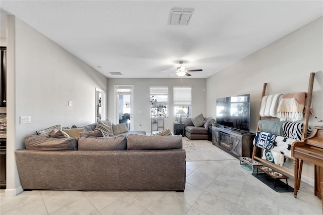 living room featuring ceiling fan