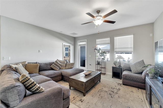 living room featuring ceiling fan