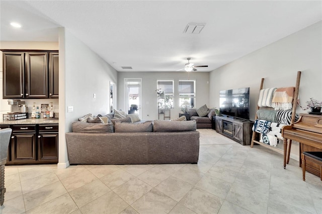 living room with ceiling fan