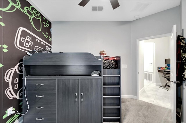 interior space featuring carpet flooring and ceiling fan