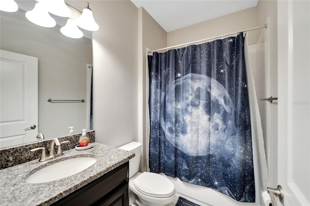 full bathroom featuring vanity, toilet, and shower / bathtub combination with curtain