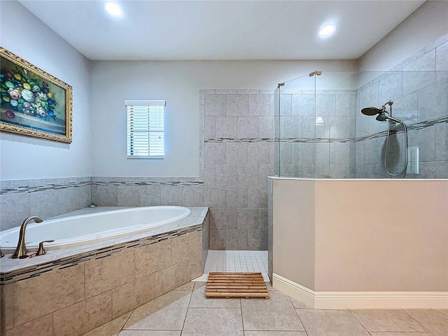 bathroom featuring tile patterned flooring and plus walk in shower