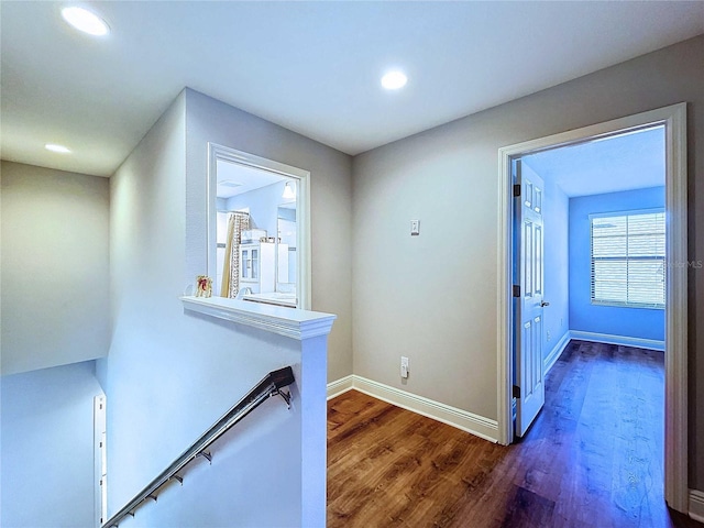 hallway featuring dark hardwood / wood-style flooring