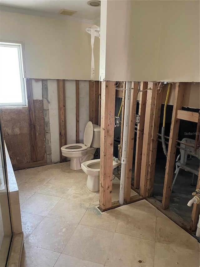 909 Mandalay Ave, Clearwater Beach, FL 33767 - bathroom with toilet and a bidet