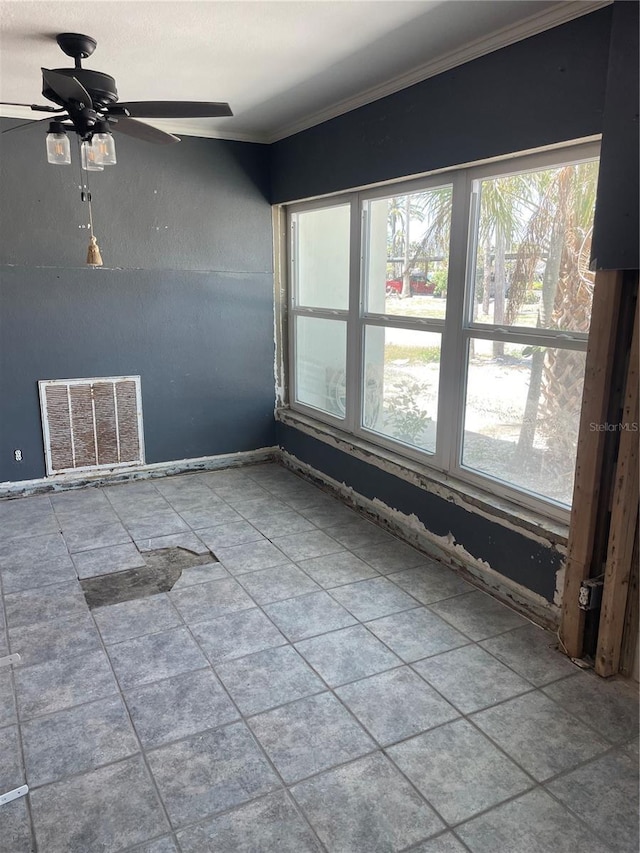 909 Mandalay Ave, Clearwater Beach, FL 33767 - unfurnished room with ornamental molding, visible vents, ceiling fan, and plenty of natural light