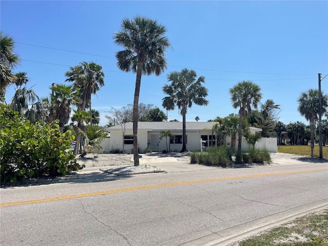 909 Mandalay Ave, Clearwater Beach, FL 33767 - ranch-style house featuring stucco siding